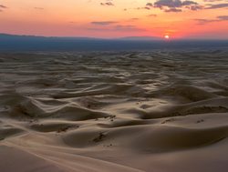 20211002174052 Singing sand dunes in Gobi at sunset